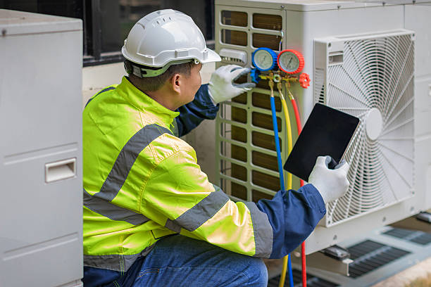 Professional Ac Installation technician working in Munford, AL